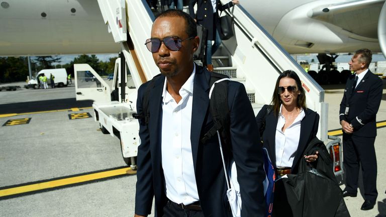 Tiger Woods arrives in Paris after his memorable win at the Tour Championship