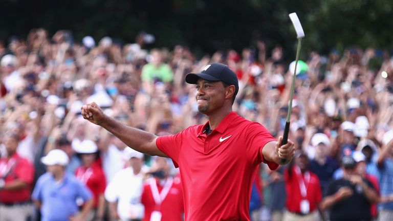 There were emotional scenes as Tiger Woods won his first title in five years with victory at the Tour Championship