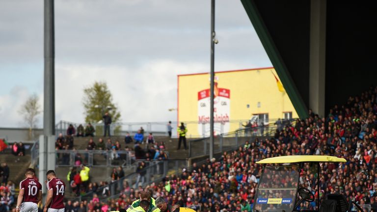 Parsons is treated after his injury