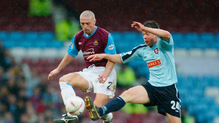 Tomas Repka of West Ham United battles for the ball in with Matt Fryatt of Walsall during the Nationwide Division One match between West Ham United and Walsall at Upton Park on March 6, 2004 in London. 