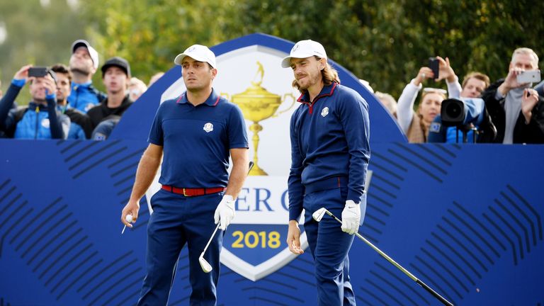 PARIS, FRANCE - SEPTEMBER 28:  Tommy Fleetwood of Europe plays his shot from the eighth tee watched by Francesco Molinari of Europe during the morning fourball matches of the 2018 Ryder Cup at Le Golf National on September 28, 2018 in Paris, France.  (Photo by Ross Kinnaird/Getty Images)
