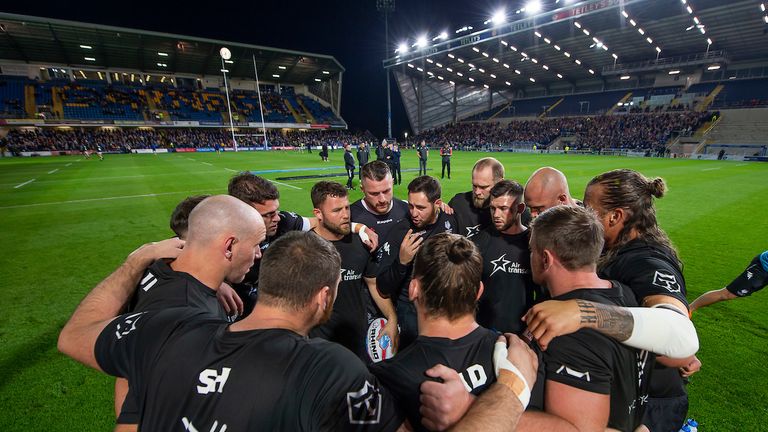 Toronto huddle up prior to their game against Leeds.