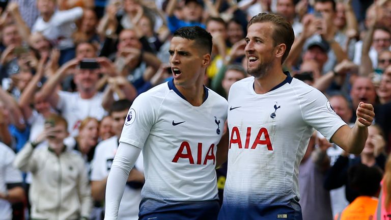 Tottenham Hotspur's English striker Harry Kane (R) celebrates with Tottenham Hotspur's Argentinian midfielder Erik Lamela after scoring their third goal during the English Premier League football match between Tottenham Hotspur and Fulham at Wembley Stadium in London, on August 18, 2018