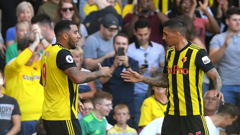 Troy Deeney celebrates scoring for Watford against Spurs