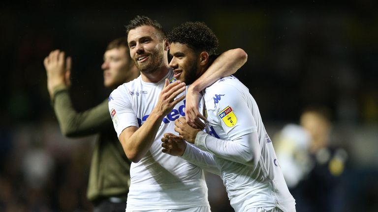 Leeds United's Tyler Roberts (right) and Stuart Dallas celebrate after the final whistle during the Sky Bet Championship match at Elland Road, Leeds. PRESS ASSOCIATION Photo. Picture date: Tuesday September 18, 2018. See PA story SOCCER Leeds. Photo credit should read: Nigel French/PA Wire. RESTRICTIONS: EDITORIAL USE ONLY No use with unauthorised audio, video, data, fixture lists, club/league logos or "live" services. Online in-match use limited to 120 images, no video emulation. No use in betting, games or single club/league/player publications.