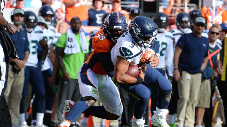 DENVER, CO - SEPTEMBER 9:  Linebacker Von Miller #58 of the Denver Broncos sacks quarterback Russell Wilson #3 of the Seattle Seahawks at Broncos Stadium at Mile High on September 9, 2018 in {Denver, Colorado. (Photo by Bart Young/Getty Images)  ***Local Caption*** Von Miller;Russell Wilson