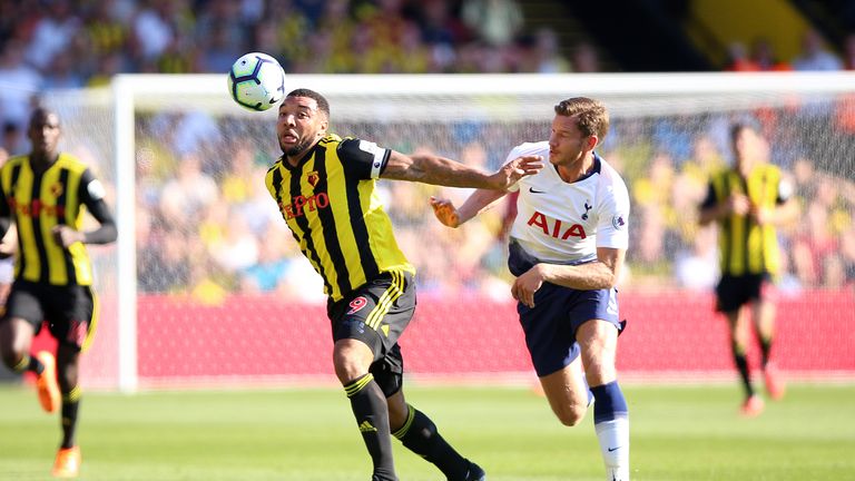 Watford's Troy Deeney (left) and Tottenham Hotspur's Jan Vertonghen battle for the ball 