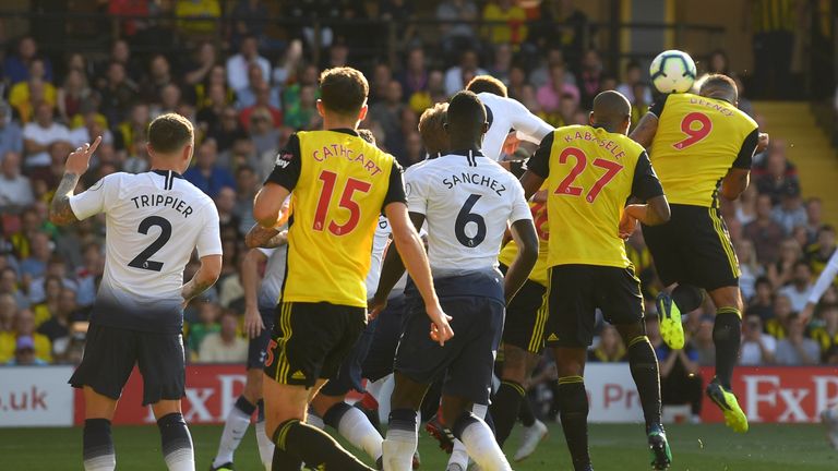 Troy Deeney of Watford (9) scores his team's first goal during the Premier League match between Watford FC and Tottenham Hotspur at Vicarage Road on September 2, 2018 in Watford, United Kingdom