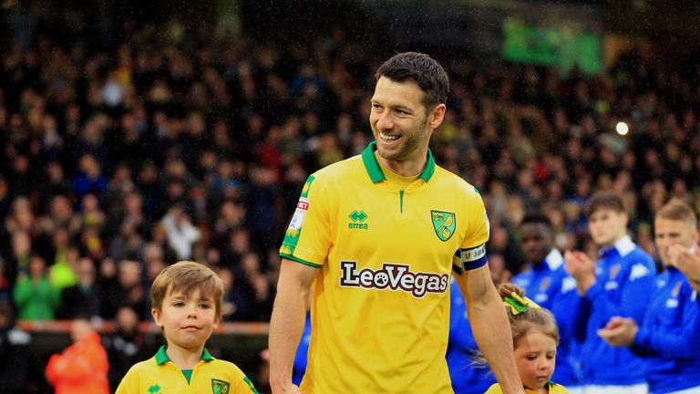 Wes Hoolahan of Norwich City walks out with his children to a guard of honour as he makes his last appearance for the club during the Sky Bet Championship match between Norwich City and Leeds United at Carrow Road on April 28, 2018 in Norwich, England.
