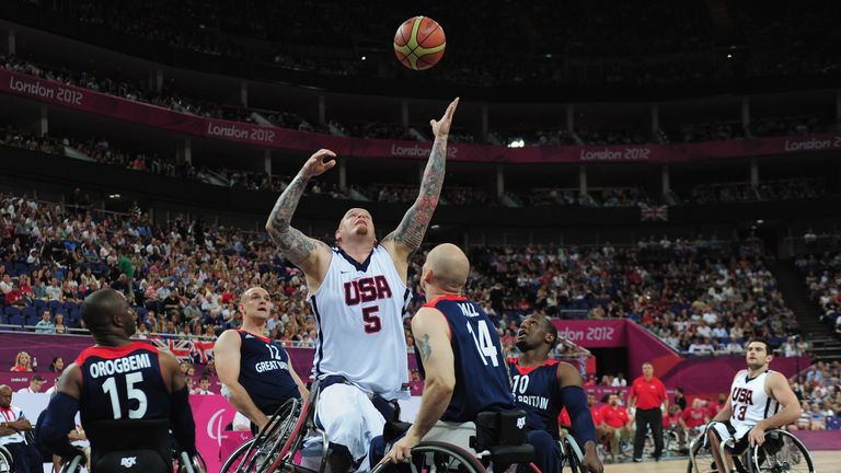 Joseph Chambers of United States reaches for the ball during the bronze medal Wheelchair Basketball match between United States and Great Britain on day 10 of the London 2012 Paralympic Games at North Greenwich Arena on September 8, 2012 in London, England