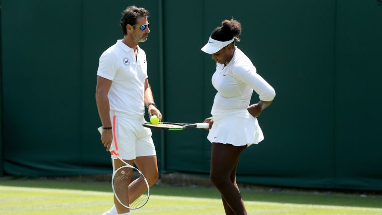LONDON, ENGLAND - JUNE 28:  Coach Patrick Mouratoglou and Serena Williams of the United States confer as she practices on court during training for the Wimbledon Lawn Tennis Championships at the All England Lawn Tennis and Croquet Club at Wimbledon on June 28, 2018 in London, England.  (Photo by Matthew Stockman/Getty Images)