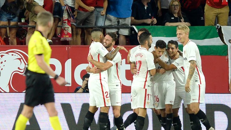 Sevilla players celebrate Wissam Ben Yedder's goal