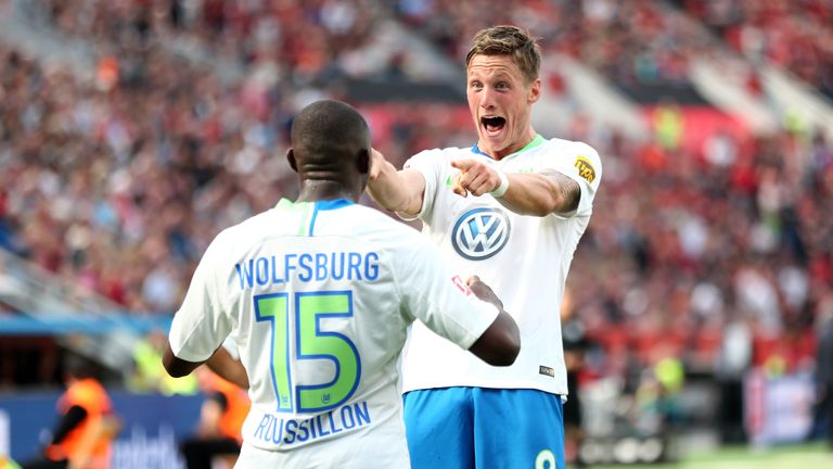 Wout Weghorst celebrates giving Wolfsburg the lead against  Bayer Leverkusen