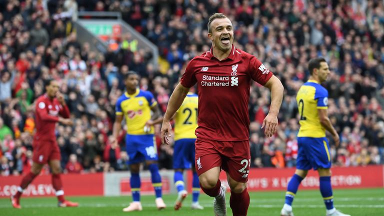 Xherdan Shaqiri celebrates a Wesley Hoedt own goal