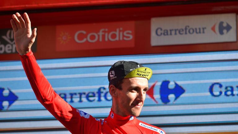 Simon Yates kept hold of his Vuelta a Espana lead after stage 18