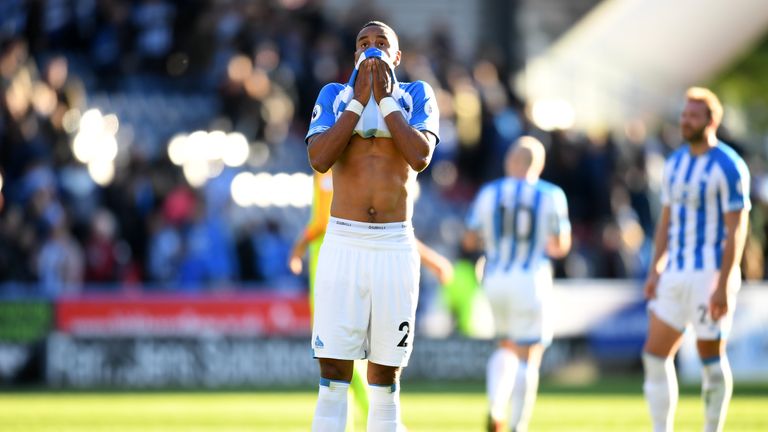 Zanka Jorgensen holds his head in his hands following Huddersfield's defeat to Tottenham