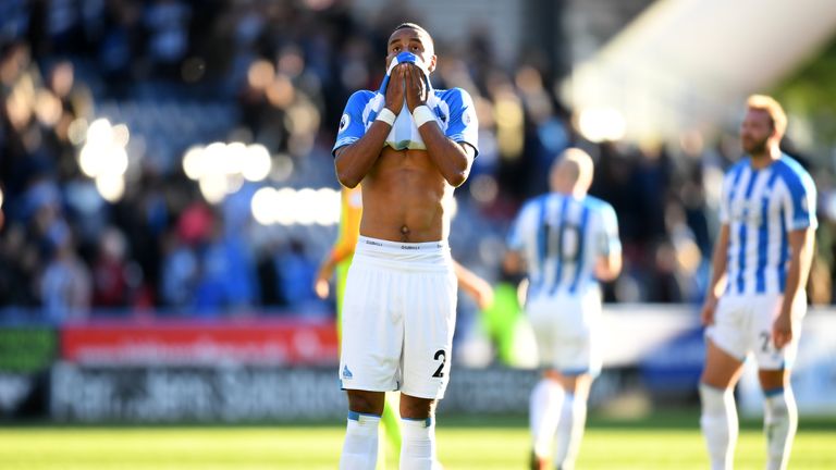 Zanka Jorgensen holds his head in his hands following Huddersfield&#39;s defeat to Tottenham