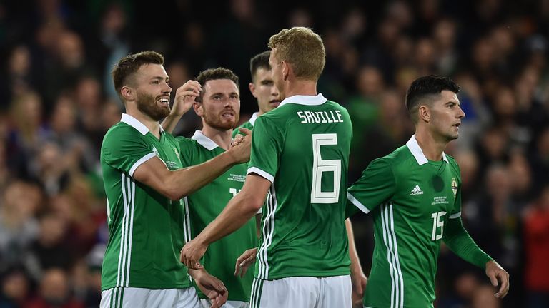 Stuart Dallas celebrates after putting Northern Ireland 2-0 up