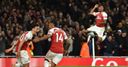Ozil, Aubameyang spark comeback win