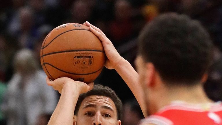 Klay Thompson fired an NBA-record 14 three-pointers for Golden State 