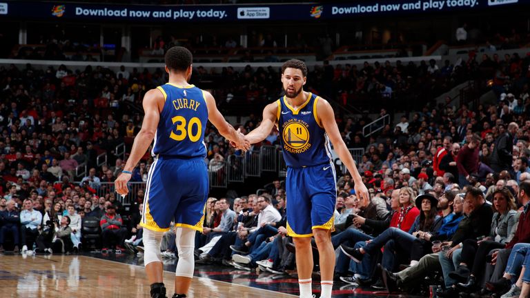 Klay Thompson is congratulated by team-mate Steph Curry