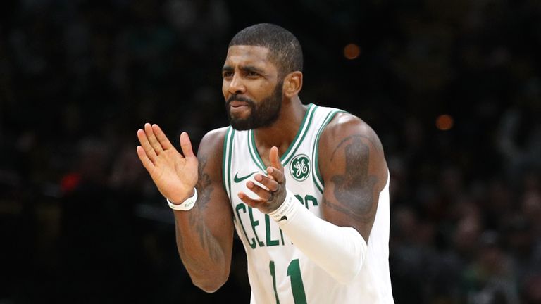 Kyrie Irving applauds his Celtics team-mates