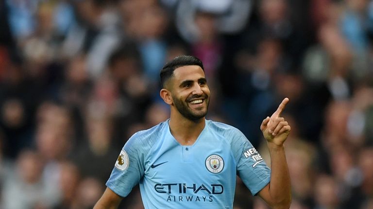 Riyad Mahrez celebrates after scoring Man City's fourth against Burnley