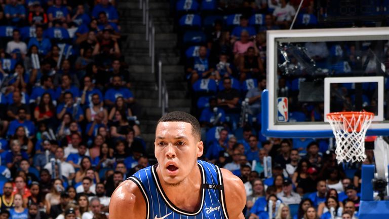 Aaron Gordon drives forward with the ball against the Miami Heat