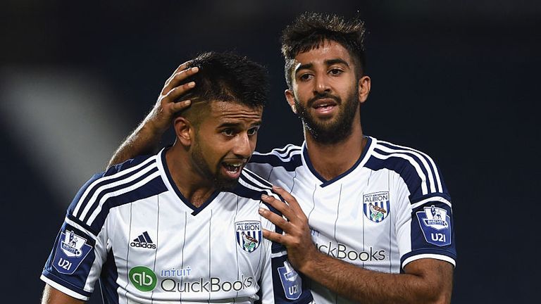 Adil Nabicelebrates a goal with brother Samir during the U21 Premier League match between West Brom and Manchester United at The Hawthorns on October 16, 2014.