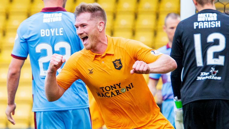 Livingston's Alan Lithgow celebrates after making it 4-0