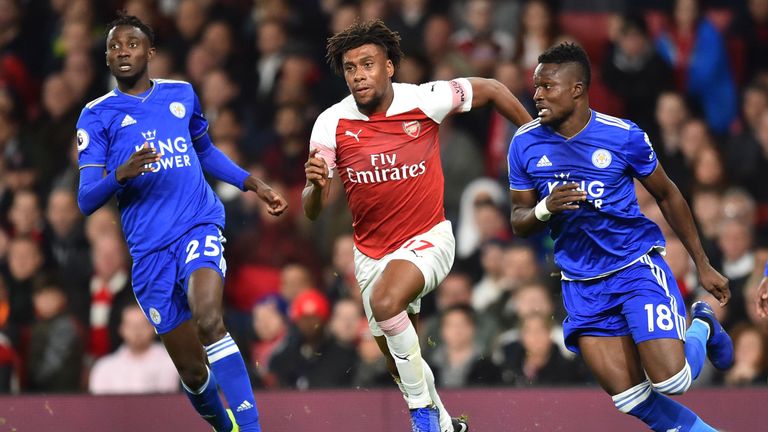 Alex Iwobi takes on Daniel Amartey