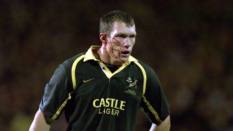 25 Aug 2001: Andre Snyman #13 of South Africa leaves the field with a head wound during the Tri Nations match between New Zealand and South Africa played at Eden Park in Auckland, New Zealand. New Zealand defeated South Africa 26-15.