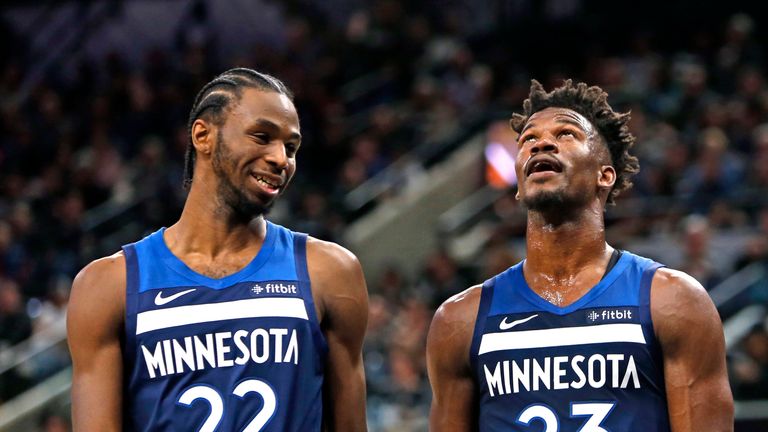 Andrew Wiggins and Jimmy Buttler talk after a foul called against the San Antonio Spurs