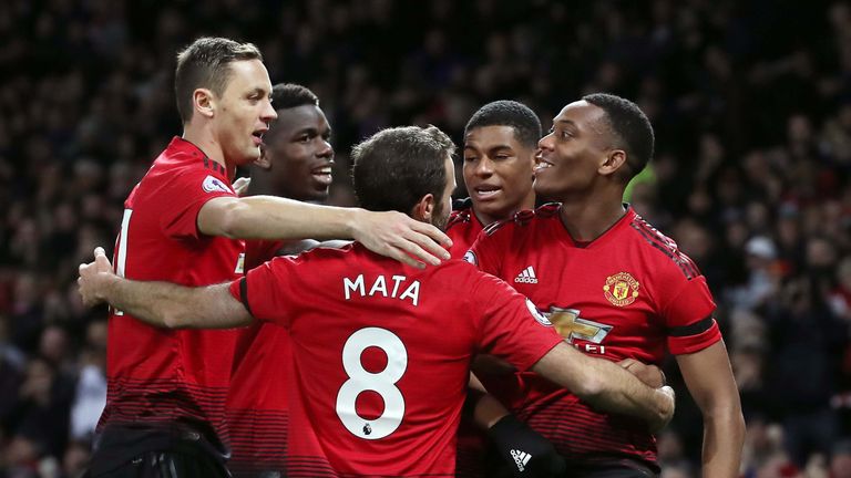 Anthony Martial celebrates scoring against Everton with his Manchester United team-mates