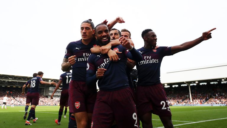 Arsenal celebrate during the Premier League match against Fulham at Craven Cottage on October 7, 2018 in London, United Kingdom
