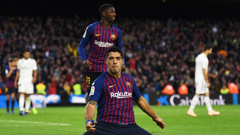 Luis Suarez scored a hat-trick as Barcelona thumped Real Madrid