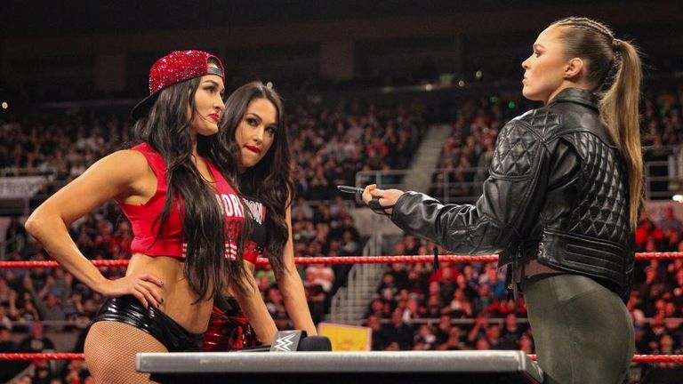 Ronda Rousey and Nikki Bella made their WWE Raw Women's title match at WWE Evolution official