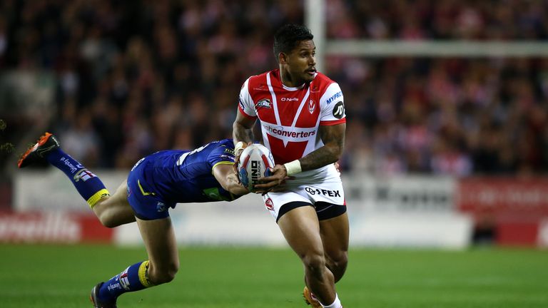 Ben Barba of St Helens is tackled by Toby King of Warrington Wolves during the BetFred Super League semi final match between St Helens and Warrington Wolves at Totally Wicked Stadium on October 4, 2018 in St Helens, England.