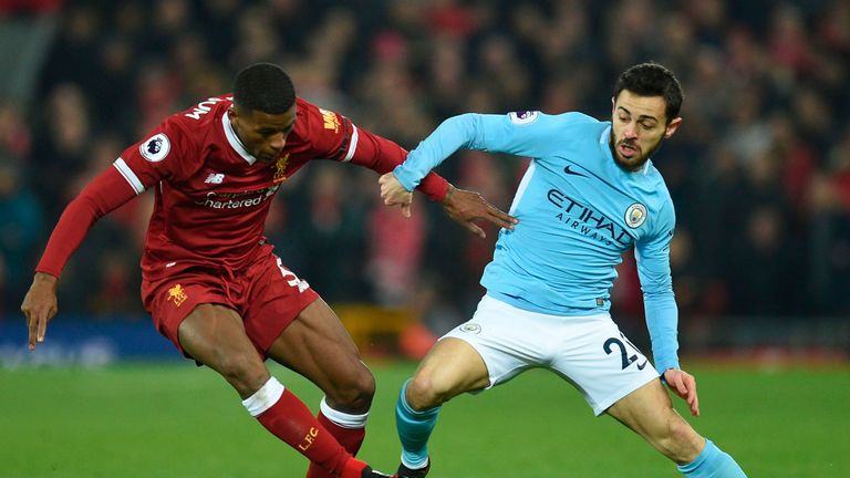 Bernando Silva and Georginio Wijnaldum in action during Liverpool's 4-3 win against Manchester City