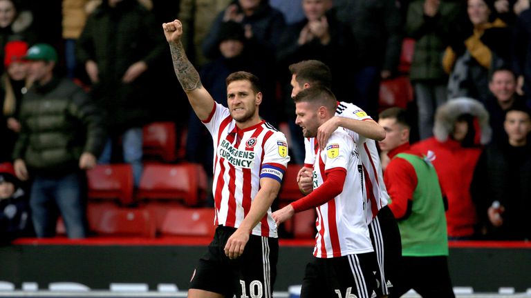 Sheffield United's Billy Sharp (Left) celebrates after he scores his sides fourth goal.