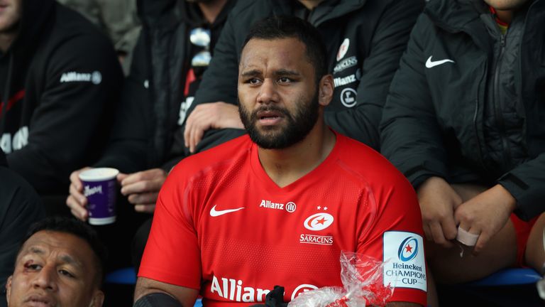 Saracens' Billy Vunipola nurses an arm injury during his side's Champions Cup clash with Glasgow