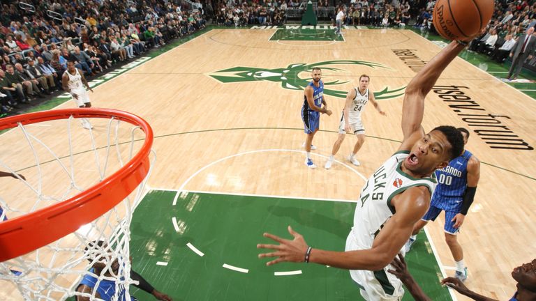 MILWUAKEE, WI - OCTOBER 27:  Giannis Antetokounmpo #34 of the Milwaukee Bucks dunks the ball against the Orlando Magic on October 27, 2018 at the Fiserv Forum in Milwaukee, Wisconsin. NOTE TO USER: User expressly acknowledges and agrees that, by downloading and or using this Photograph, user is consenting to the terms and conditions of the Getty Images License Agreement. Mandatory Copyright Notice: Copyright 2018 NBAE (Photo by Gary Dineen/NBAE via Getty Images)