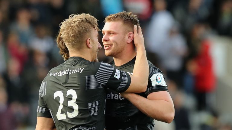 Callum Chick, (R) of Newcastle Falcons, who scored the last minute, match winning try celebrates with team mate Chris Harris after their victory during the Champions Cup match between Newcastle Falcons and Montpellier Herault Rugby at Kingston Park on October 21, 2018 in Newcastle upon Tyne, United Kingdom.