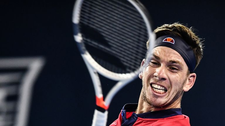 Cameron Norrie of Britain hits a return during his men's singles match against Yoshihito Nishioka of Japan at the ATP Shenzhen Open tennis tournament in Shenzhen, in south China's Guangdong province on September 28, 2018