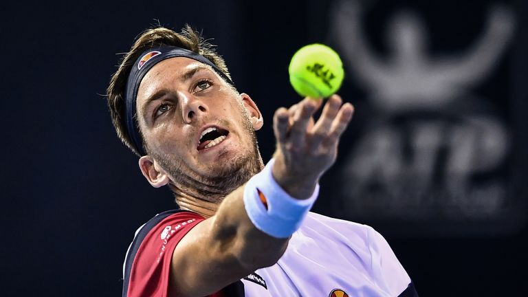 Cameron Norrie of Britain serves during his men's singles match against Yoshihito Nishioka of Japan at the ATP Shenzhen Open tennis tournament in Shenzhen, in south China's Guangdong province on September 28, 2018. 