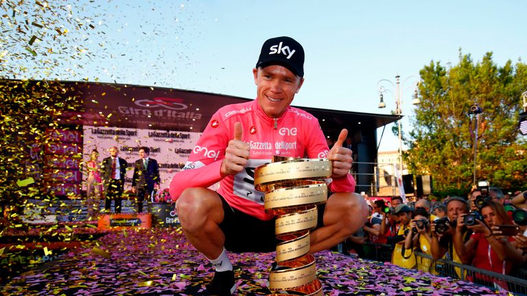 Chris Froome poses with the Giro d'Italia trophy
