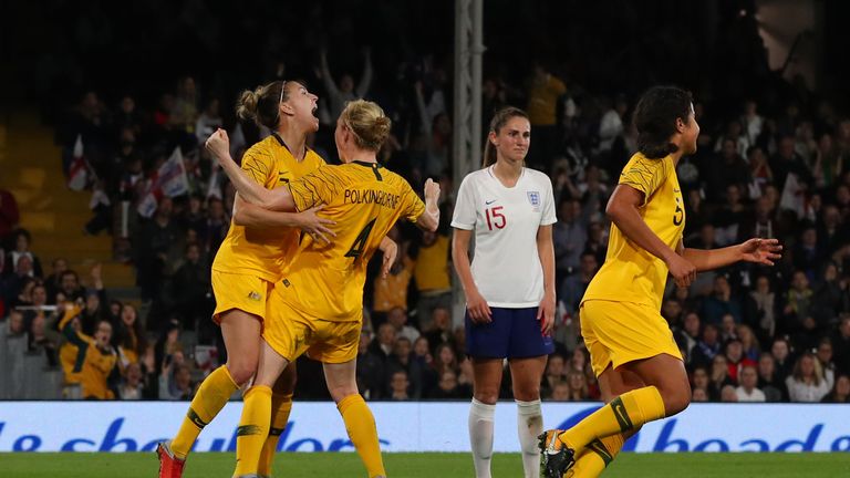 Clare Polkinghorne of Australia celebrates after scoring against England