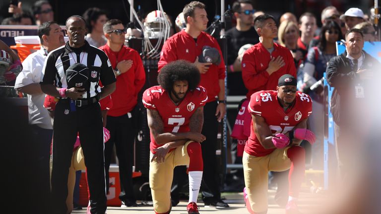 Colin Kaepernick kneels in protest during the national anthem prior to a game against the Tampa Bay Buccaneers in 2016