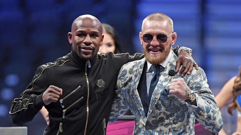 Floyd Mayweather Jr. Conor McGregor in the round of their super welterweight boxing match at T-Mobile Arena on August 26, 2017 in Las Vegas, Nevada. Mayweather won by 10th-round TKO.