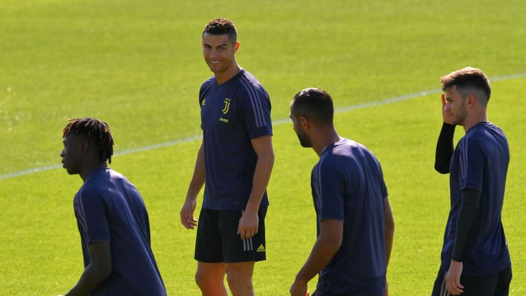 Cristiano Ronaldo was all smiles as he trained for Juventus on Monday